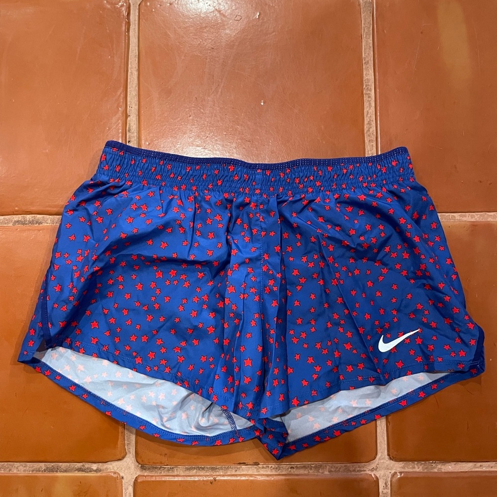 Nike Women's Athletic Shorts in Blue with Red Stars Running